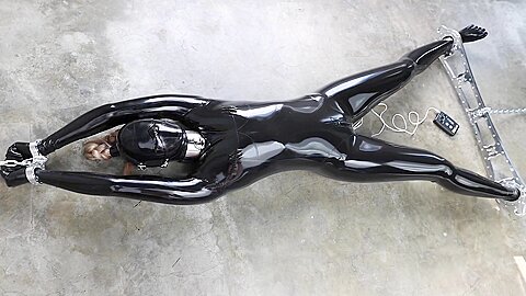Rubber-bound Girl In Electro Play :: Latex BDSM Slave Spread Eagle Scene