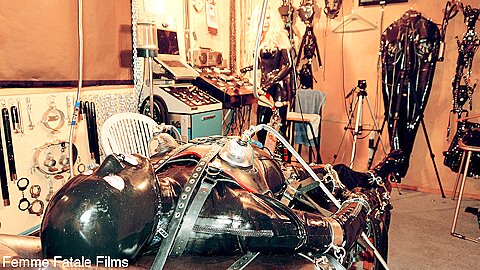 Extreme Bondage With Mistress Eleise De Lacy :: Blonde Dominatrix Fucks Sub Face in Latex