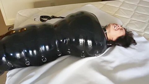 Inflatable Latex Cocoon 2 :: Brunette in Tight Black Latex Bodysuit Sex Scene