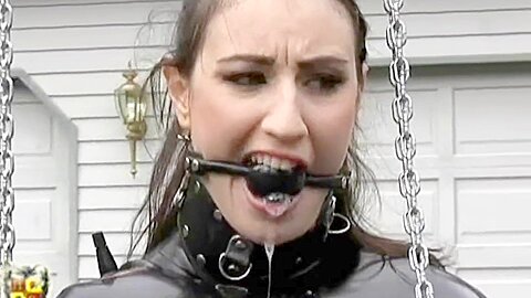Inflatable Latex :: Latex Strapped Woman In Tight Suit With Chains